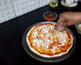 A picture of step 11 of Chicken Tikka Pizza.