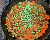 A picture of step 10 of Chicken Rice One Skillet.