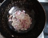 A picture of step 2 of Chicken bharta.