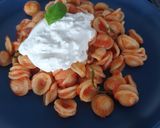 A picture of step 3 of Orecchiette with tomato and burrata cheese.