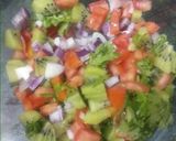 A picture of step 1 of Kiwi Salsa.
