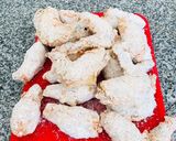 Foto del paso 7 de la receta: Alitas de pollo rebozada y fritas