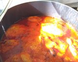 Foto del paso 7 de la receta: Patitas de puerco capeadas en salsa roja