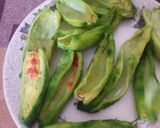 A picture of step 5 of Bharva karele.
