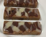 Foto del paso 8 de la receta Gofio amasado con miel de Palma, Almendras y Pasas“TURRÓN CANARIO” y....Barritas con Chocolate