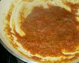 A picture of step 5 of Aaloo bangan with white rice.
