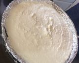 A picture of step 4 of 37 years of love blueberry cheesecake.