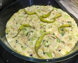A picture of step 7 of Crustless Leek Quiche with blue cheese and chillies.