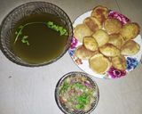 A picture of step 11 of Golgappa with spicy potato-chana masala and spicy flavored water.