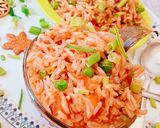 A picture of step 4 of Leftover schezwan onion pulao.