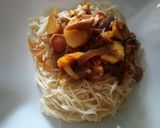 A picture of step 2 of Sausage and chicken sauce with spaghetti.