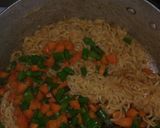 A picture of step 7 of Sallie's coconut fried noodles.