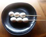 A picture of step 1 of Fried Quail Eggs on Skewers.