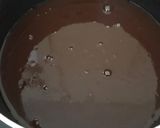 A picture of step 4 of Root beer bbq sauce.
