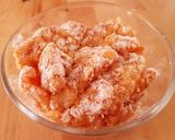 A picture of step 2 of Breast chicken popcorn with a glaze of honey ranch sauce.