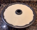 A picture of step 11 of Cream Cheese and Sweetened Condensed Milk Flan.