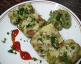 A picture of step 7 of Zucchini stuffed with cheesy Guacamole.