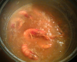 Foto del paso 6 de la receta: Traseros de pollo con gambas
