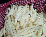A picture of step 1 of Masala french fries.