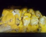 Foto del paso 10 de la receta Horneado de jamoncitos de pollo con patatas a la naranja