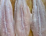A picture of step 1 of Fish with wild garlic pesto topping.