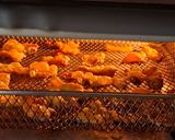 Foto del paso 3 de la receta: Chicharrón de pollo a mi estilo en air fryer