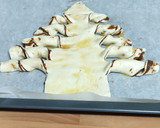 Foto del paso 6 de la receta: Arbolito de hojaldre 🎄 y chocolate