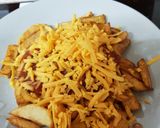 A picture of step 2 of My Homemade Chips with Salsa and grated Cheese. 😘.