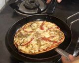 A picture of step 9 of Italian pan pizza.
