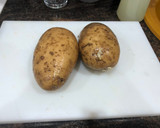 Foto del paso 4 de la receta: Salchichas cocidas con vino patatas fritas y huevo frito