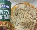 A picture of step 6 of Margareta pizza.