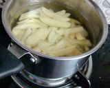 A picture of step 3 of Honey chilli potatoes.