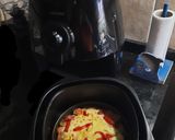 Foto del paso 5 de la receta: Milanesa con tomate, tiras de morrón y queso