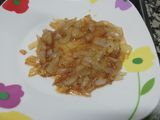 Lomo con pasas y cebolla caramelizada