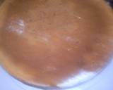 Icing a cake with butter cream,author marathon recipe step 4 photo