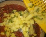 A picture of step 4 of Irish Potato source with white macaroni.