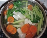 Foto langkah ke 3 dari resep Sup sawi tahu.