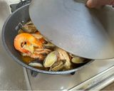 A picture of step 6 of Seafood Pan Rice.