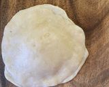 A picture of step 5 of Baked Padma Luchi.