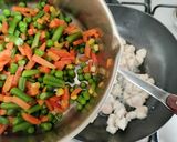 A picture of step 12 of Schezwan Fried Rice.