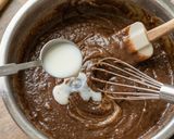 A picture of step 5 of Fudgy Prime Bites Protein Brownies.