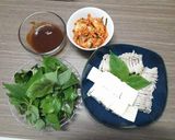 Hình bước làm 5 của món Ba chỉ đậu phụ gói kinh giới