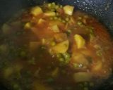 A picture of step 12 of Peas Tomato Potato Curry.