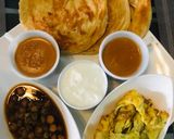 A picture of step 1 of Chana Chola, omellete and paratha.