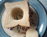 A picture of step 2 of Egg in a nest sandwich.