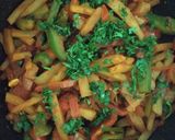 A picture of step 5 of Potato Capsicum fry.
