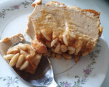 Foto del paso 4 de la receta: Tarta de queso batido con piñones