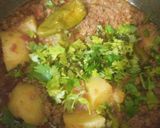 A picture of step 6 of Aloo qeema.