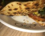 A picture of step 8 of Roti pizza on tawa.