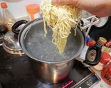 A picture of step 6 of Irresistible Rich Chicken Paitan Ramen.